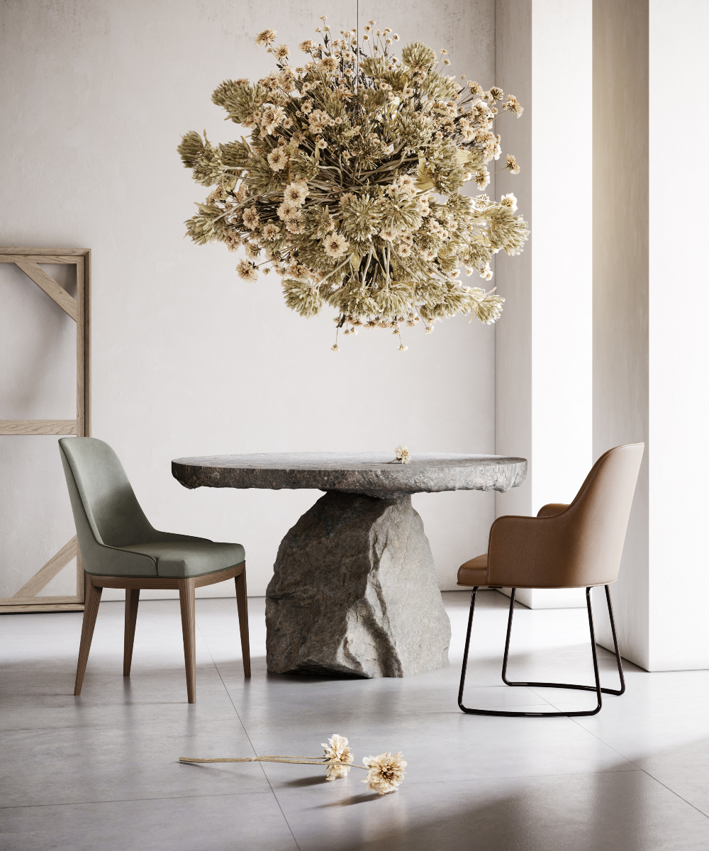 A charming dining room with dining chairs, featuring a flower suspended from the ceiling for a touch of elegance.