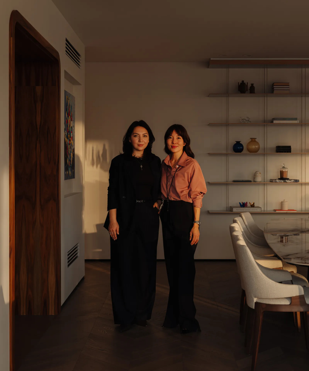 Akka Interiors team posing for a photo in the project mentioned.