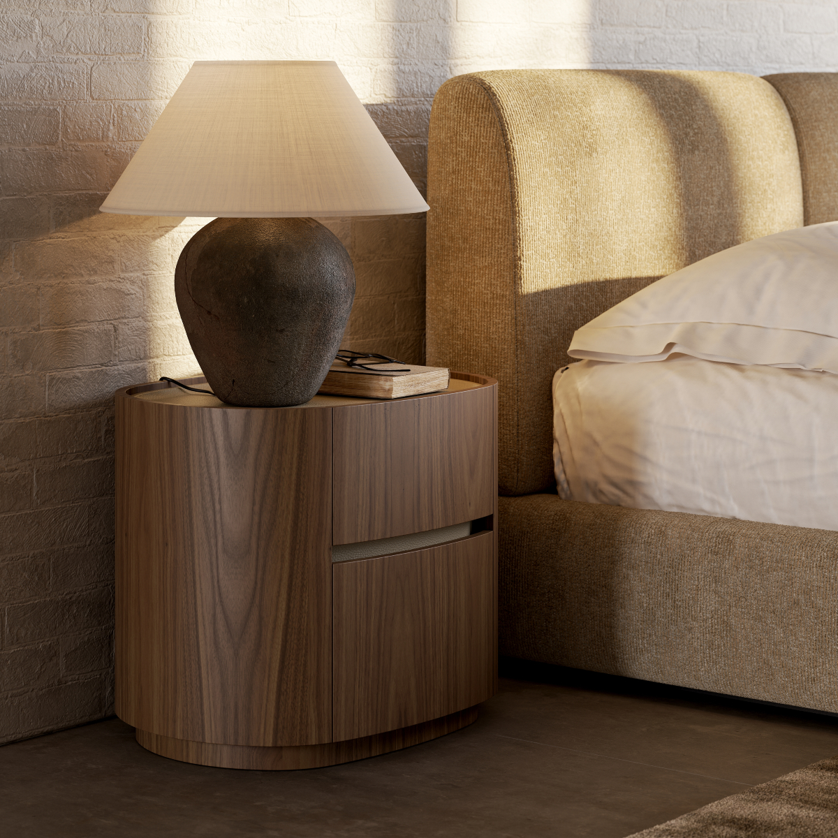 A stylish bed accompanied by a lamp on a bedside table, enhancing the bedroom design with comfort and functionality.