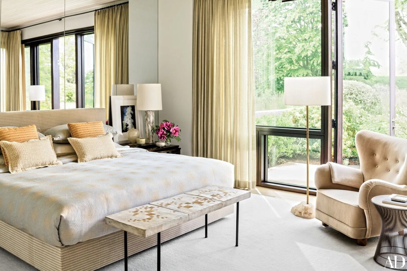 Bedroom project by Aero Studios with neutral tones and gold accents