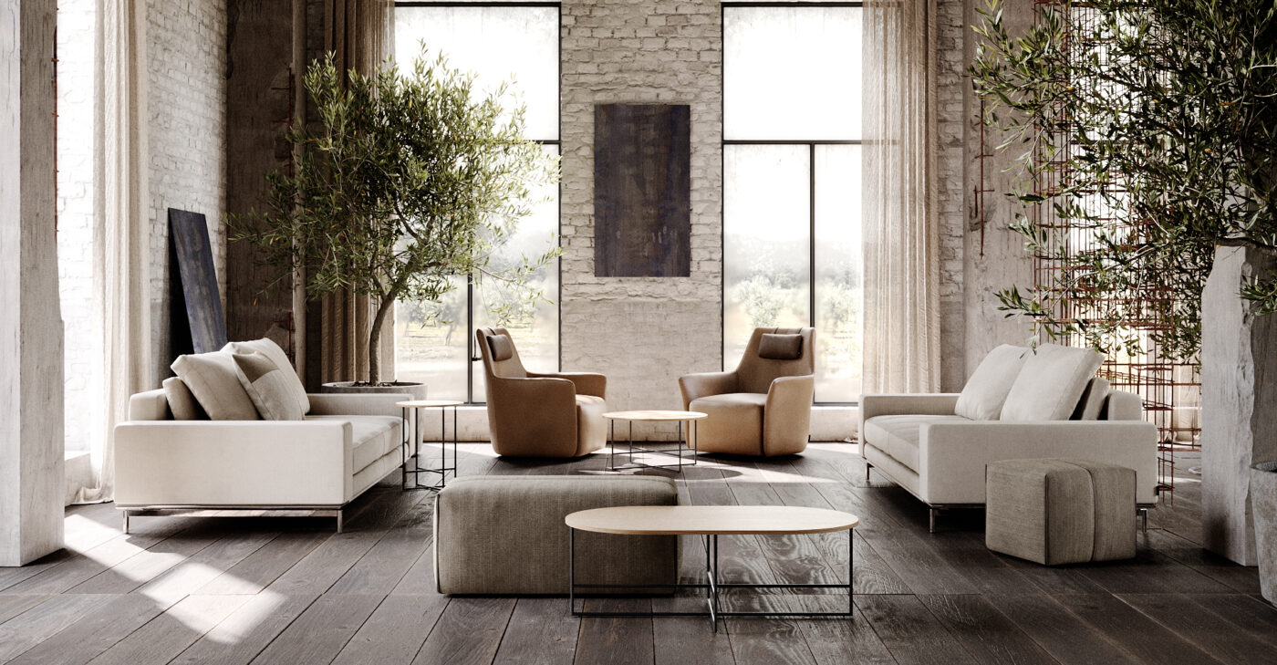 A modern living room showcasing white furniture alongside a flourishing tree, offering a fresh and peaceful environment. In the back it has two armchairs upholstered in caramel leather.