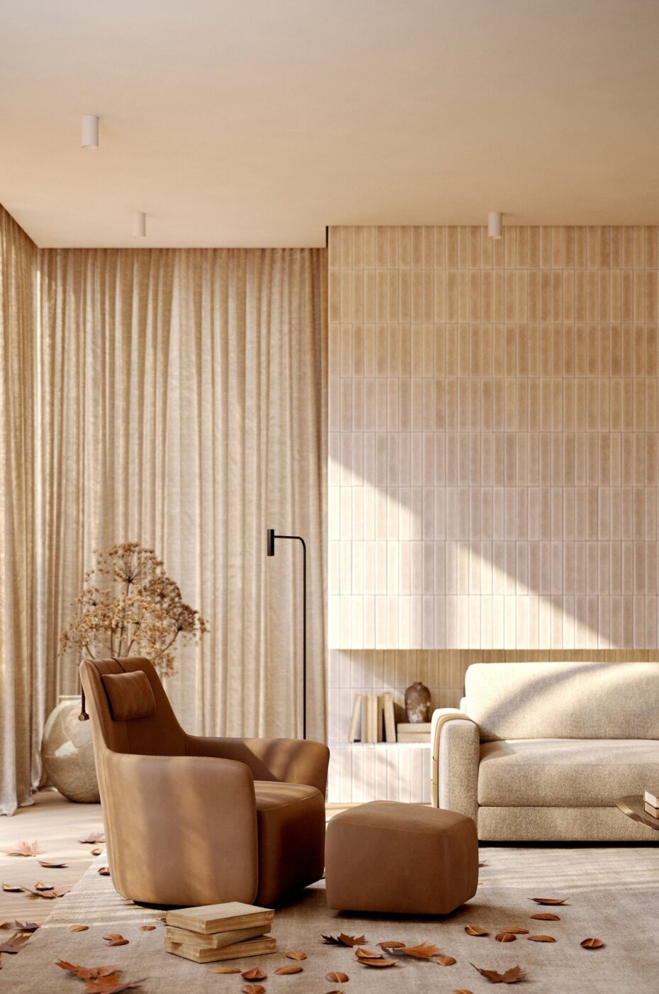 Autumn living room with Alexander Armchair in terracotta tones and leaves on the floor around it. Natural light is illuminating the room.