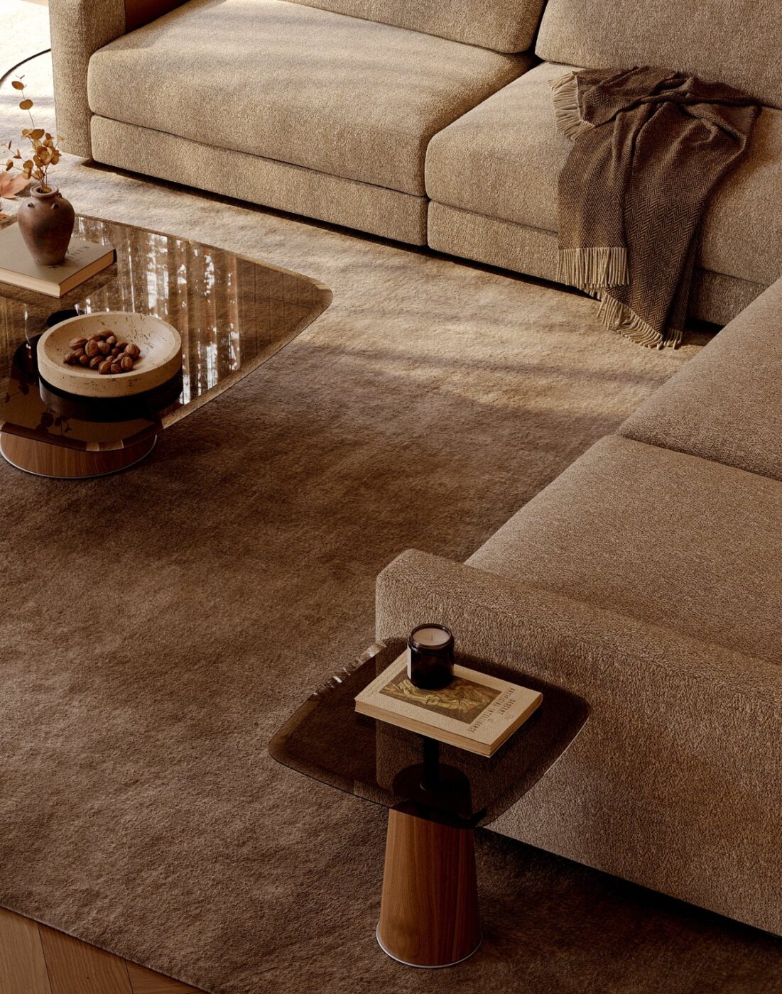 Living room in detail. With autumn decor, neutral tones and cosy details. A coffee table is by the side of the sofa.