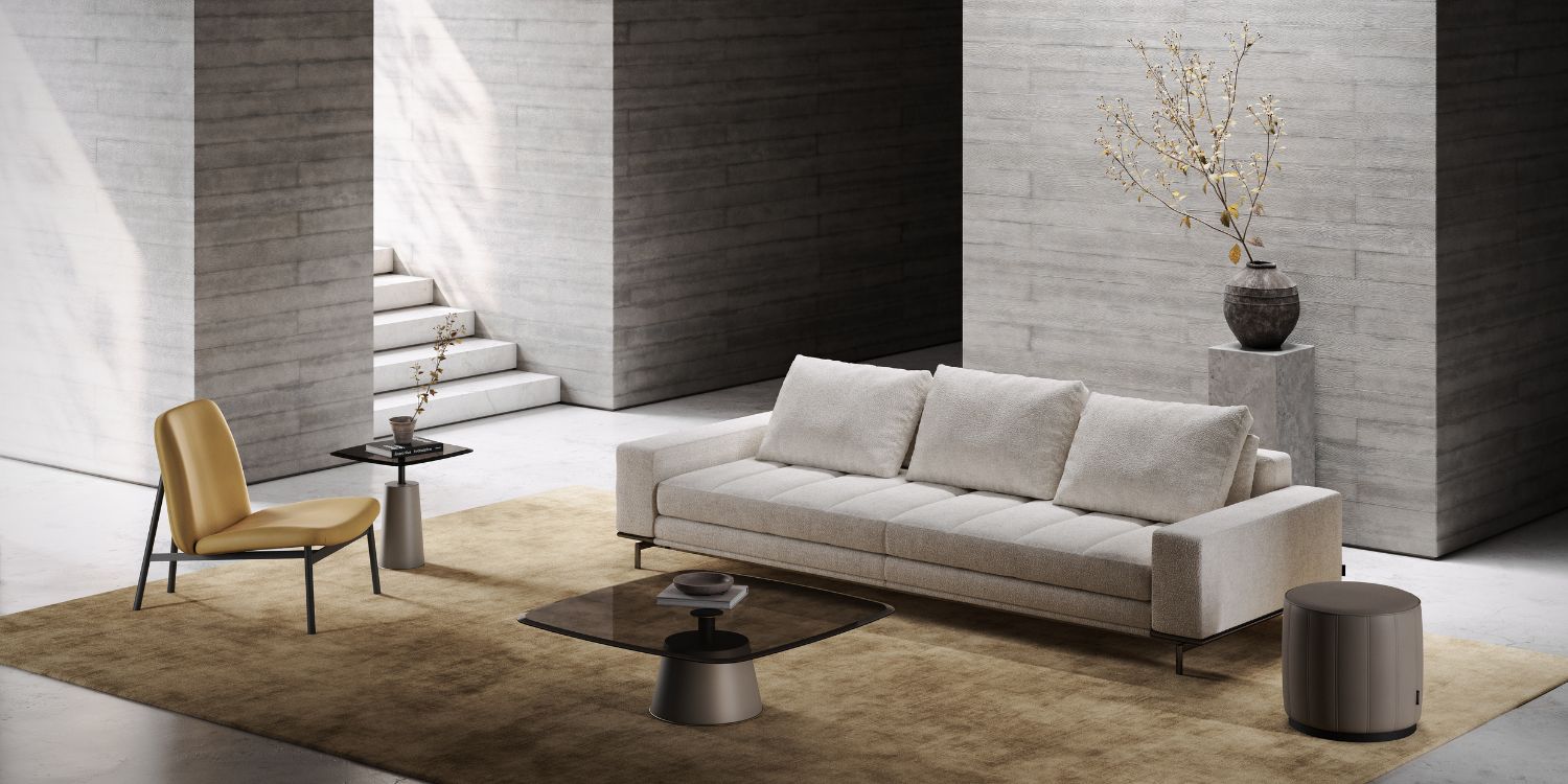 living room set with a three-seat sofa in white, an armchair in yellow, a coffee table with the top in glass and the base in wood and a pouf in brown leather.