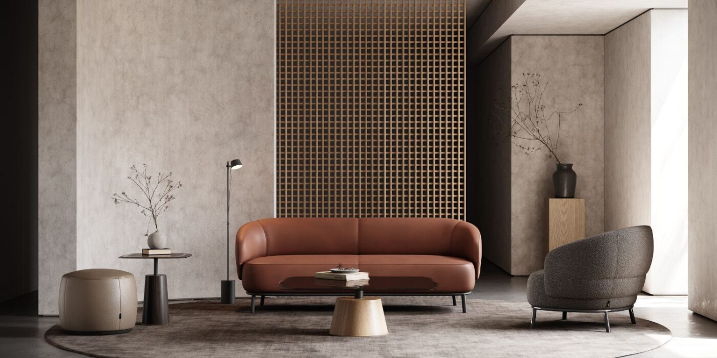 Blog Featured Image - 2026-07-10T103235.017 Contemporary living room showcasing a leather sofa and a warm wooden wall design.