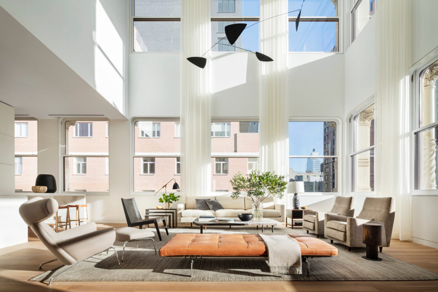 Living Room project by Brad Ford. A very airy project withh neutral tones and an orange accent in a bench.