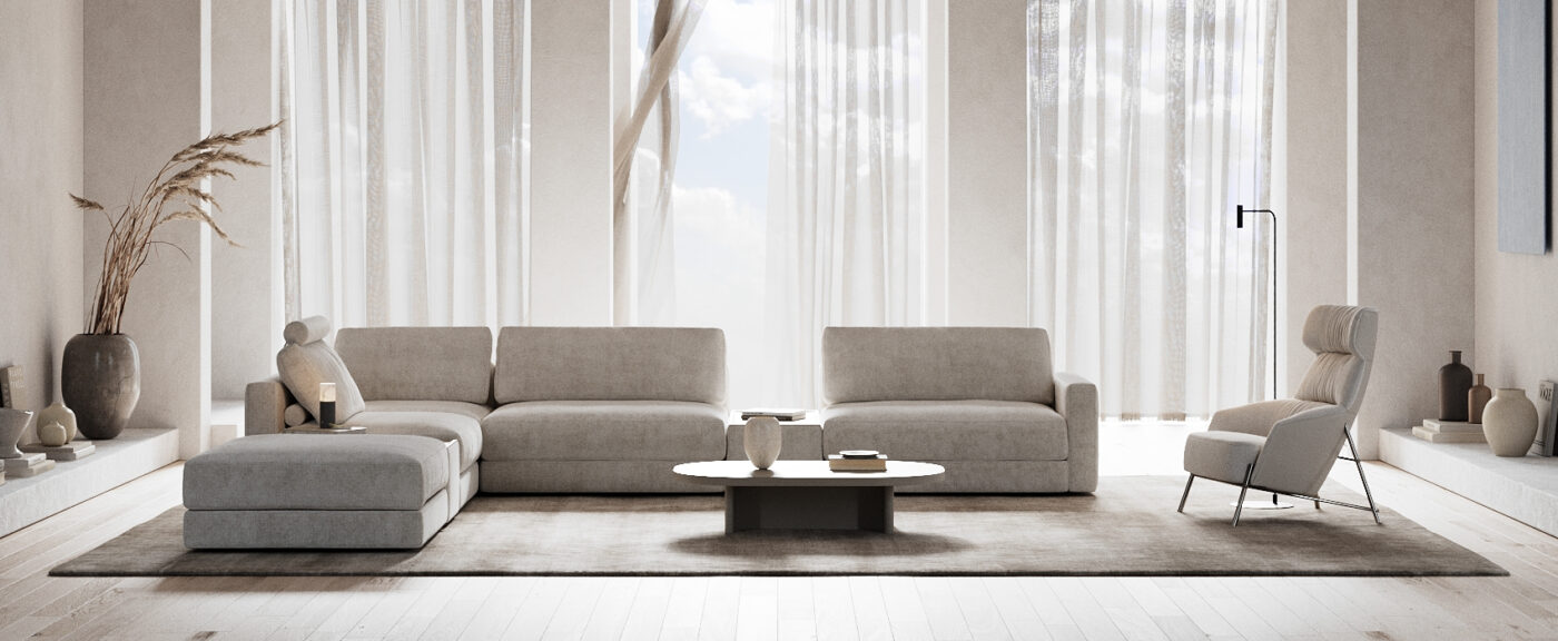 DK25 - PANTONE 2026 - 02 - H A stylish living room with a modular sofa, an armchair and a coffee table, creating an inviting space for leisure and conversation. In PANTONE 11-4201 Cloud Dancer, a billowy white imbued with a feeling of serenity: the Pantone Color of the Year selection for 2026.