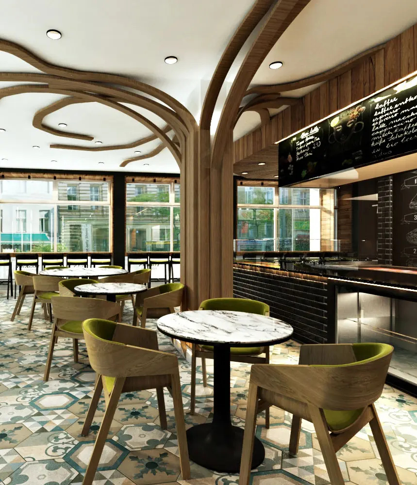 restaurant with round dining tables in white marble and wood dining chairs in green fabric. The floor is in tiles with green patterns.