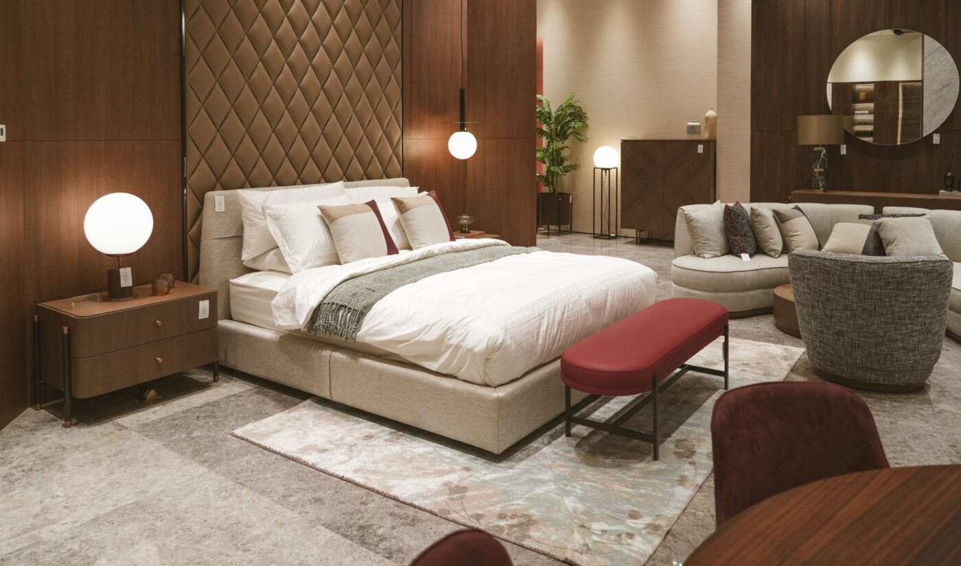 Domkapa bedroom set at the Qatar showroom with Shelby Bed and Colbert Bench in red.