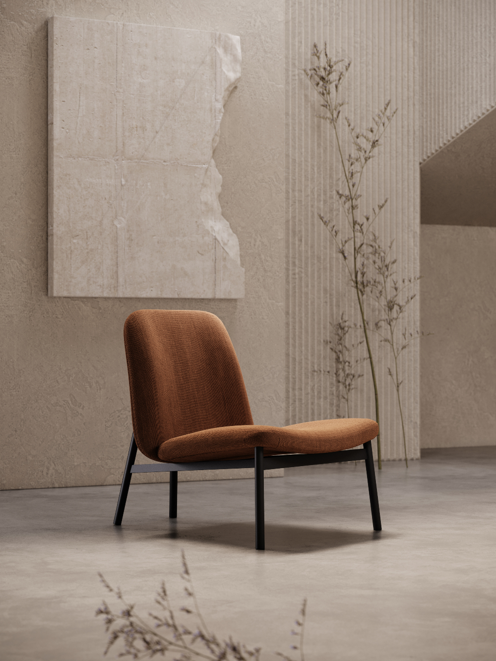 A modern interior containing an armchair, a plant, and a wall, creating a simple yet inviting atmosphere.