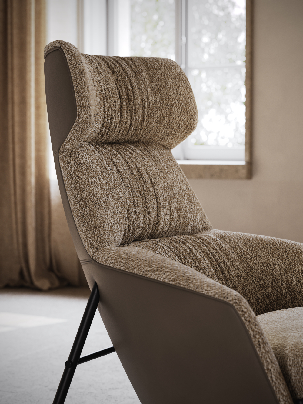 Armchair upholstered in neutral colours.