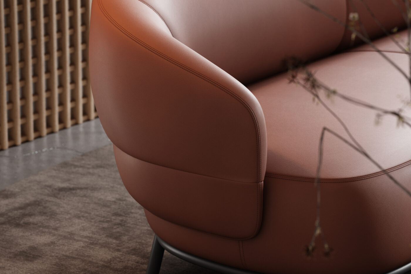 Detailed close-up of a red leather couch, highlighting its rich texture and design in an elegantly furnished room.