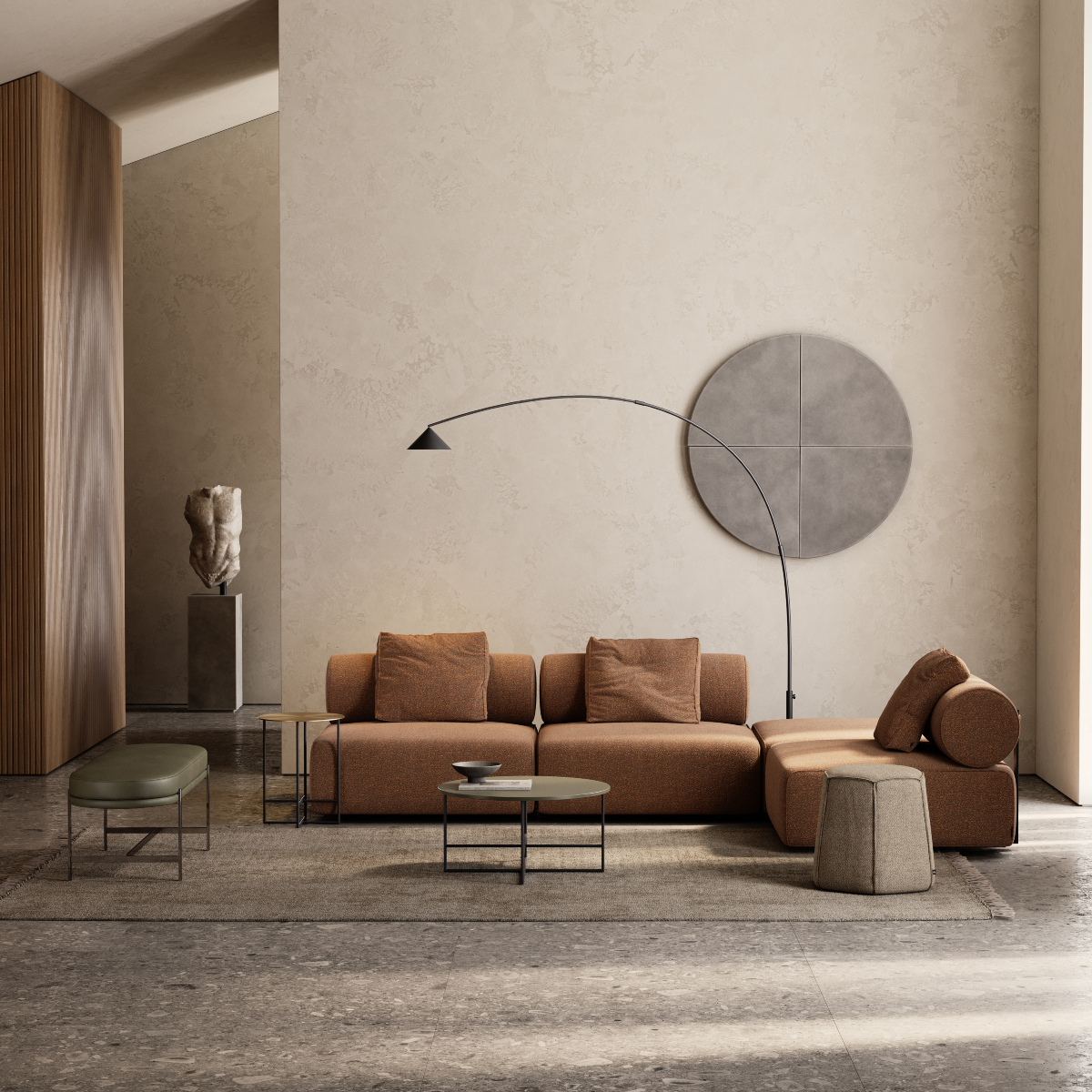 A contemporary living room showcasing a large round table, complemented by chic furniture and a warm atmosphere. With a modular sofa in orange tones and a bench in green, matching the 70s colour trends.