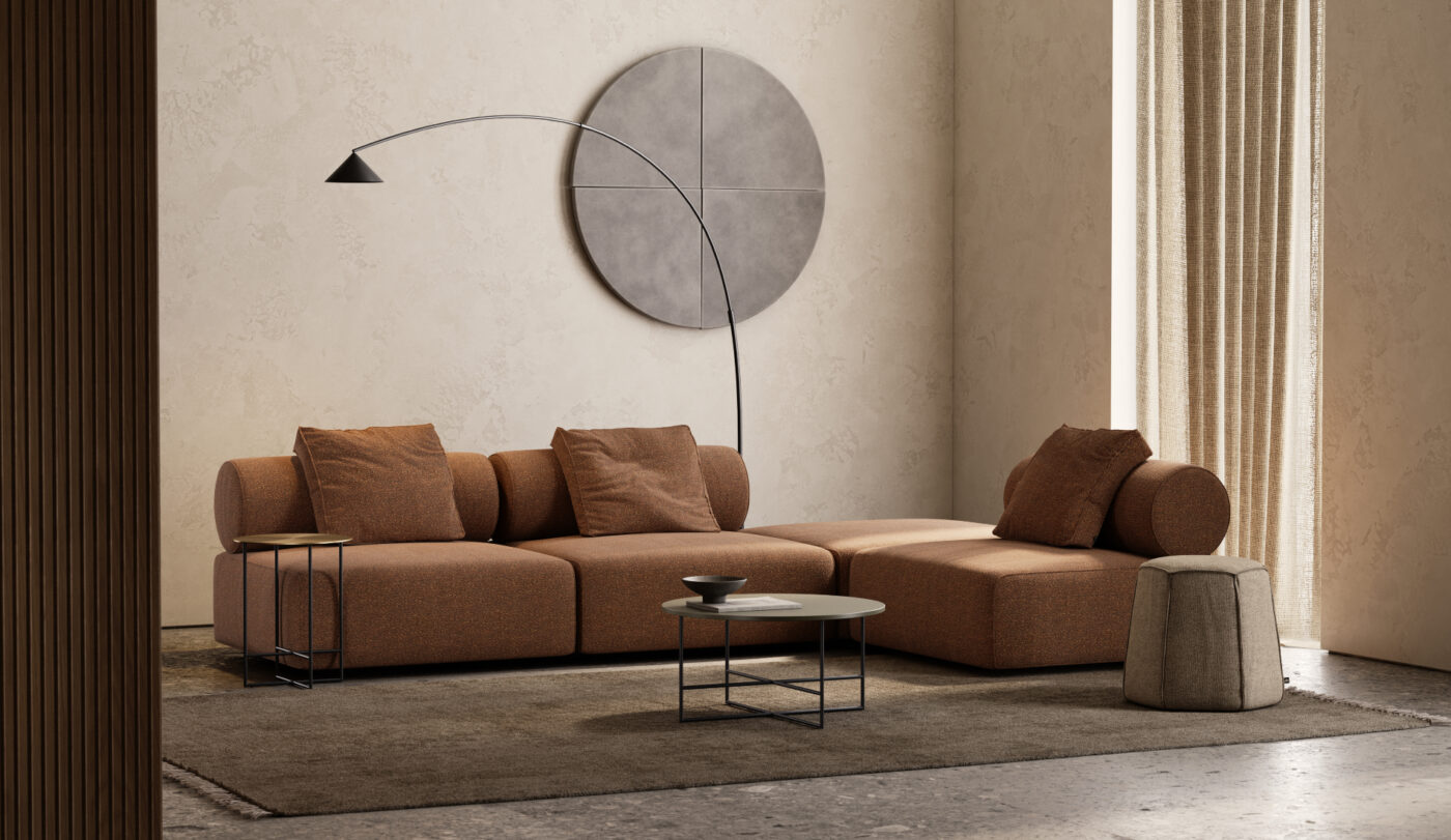 A Shibui living room featuring a round table and a modular sofa, creating a cosy and inviting atmosphere.