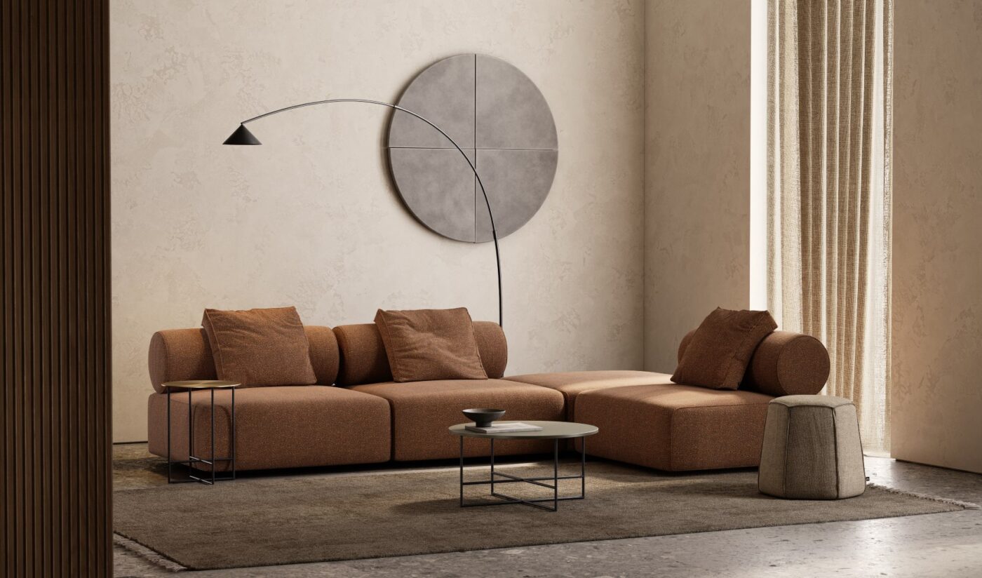 A sleek modern living room showcasing a modular sofa, an elegant pouf and a table set for added functionality. From the interior design trends for 2025