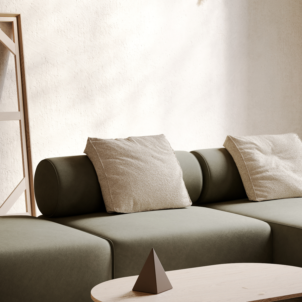 A bright living room with a soft modular sofa in dark green, a chic coffee table, and a tastefully designed wall behind the furniture.