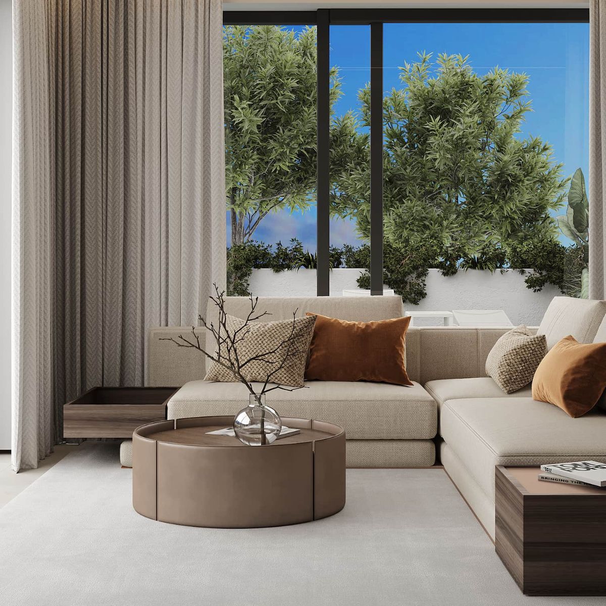 Specifying Upholstery For Hotel Suites (6) Modern living room with a beige L-shaped sofa adorned with brown and patterned cushions. A round coffee table holds a vase with branches. Floor-to-ceiling windows reveal lush greenery outside, creating a serene ambiance. Light curtains and a neutral rug complete the cozy, inviting atmosphere. By Rental 12