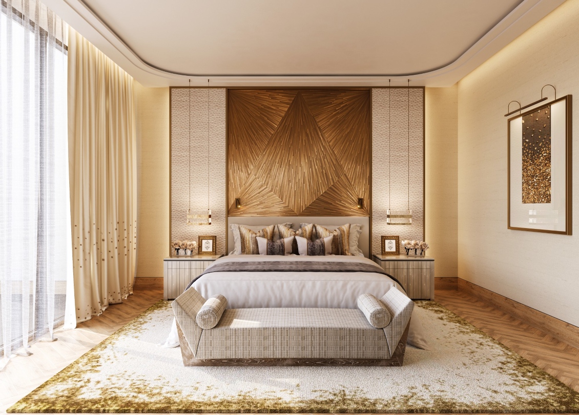 Yasmin Alsdais project in Saudi Arabia in neutral tones and classic style. It is a bedroom with neutral tones and gold accents. A bed in the center and a bench at the end.