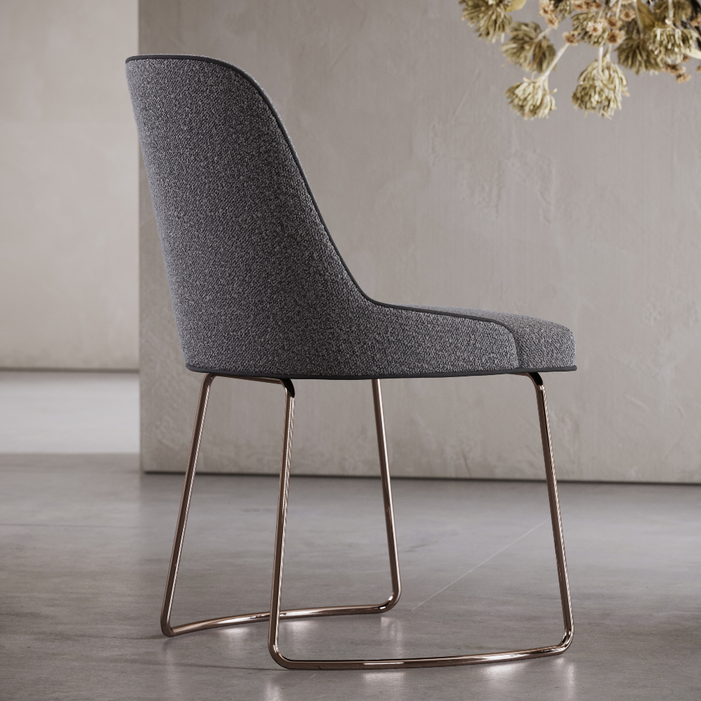 A modern chair with a grey fabric seat and a sturdy metal frame design. Perfect for a home office.