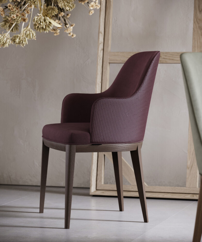 A comfortable chair with a rich purple upholstered seat and elegant wooden legs, great for any dining room.