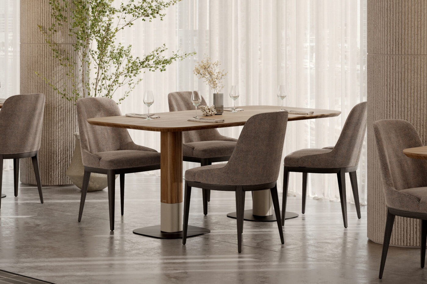 A dining area in a restaurant showcasing a table surrounded by chairs.