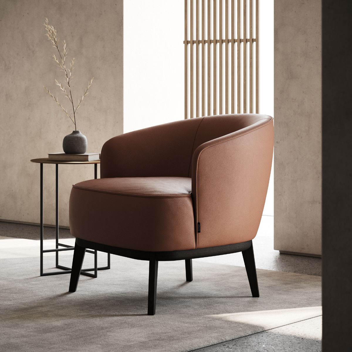 armchairs vs accent chairs by domkapa (1) A contemporary armchair placed beside a window, enhancing the room's bright and airy atmosphere.