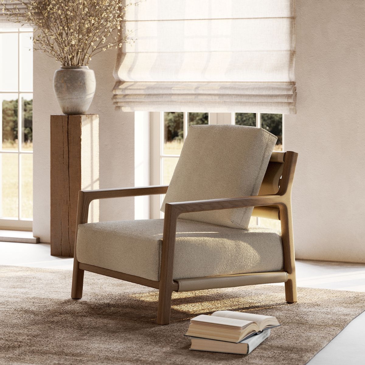 armchairs vs accent chairs by domkapa A cosy armchair and an open book sit on a rug, illuminated by natural light from a nearby window.