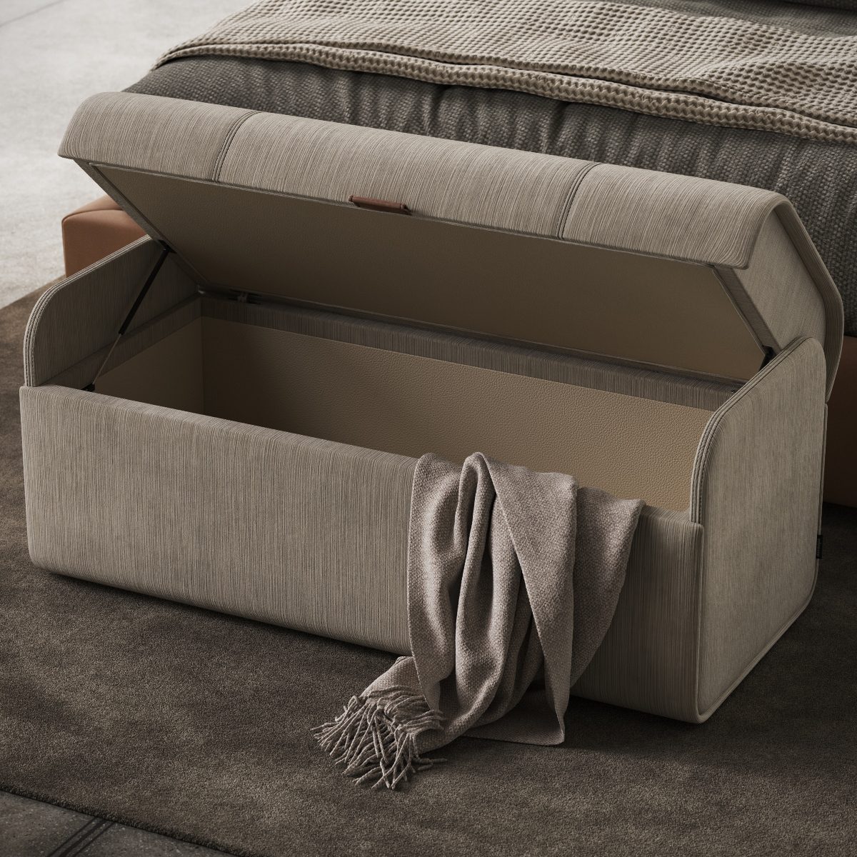bancoblog grey pouf, open in a small living room