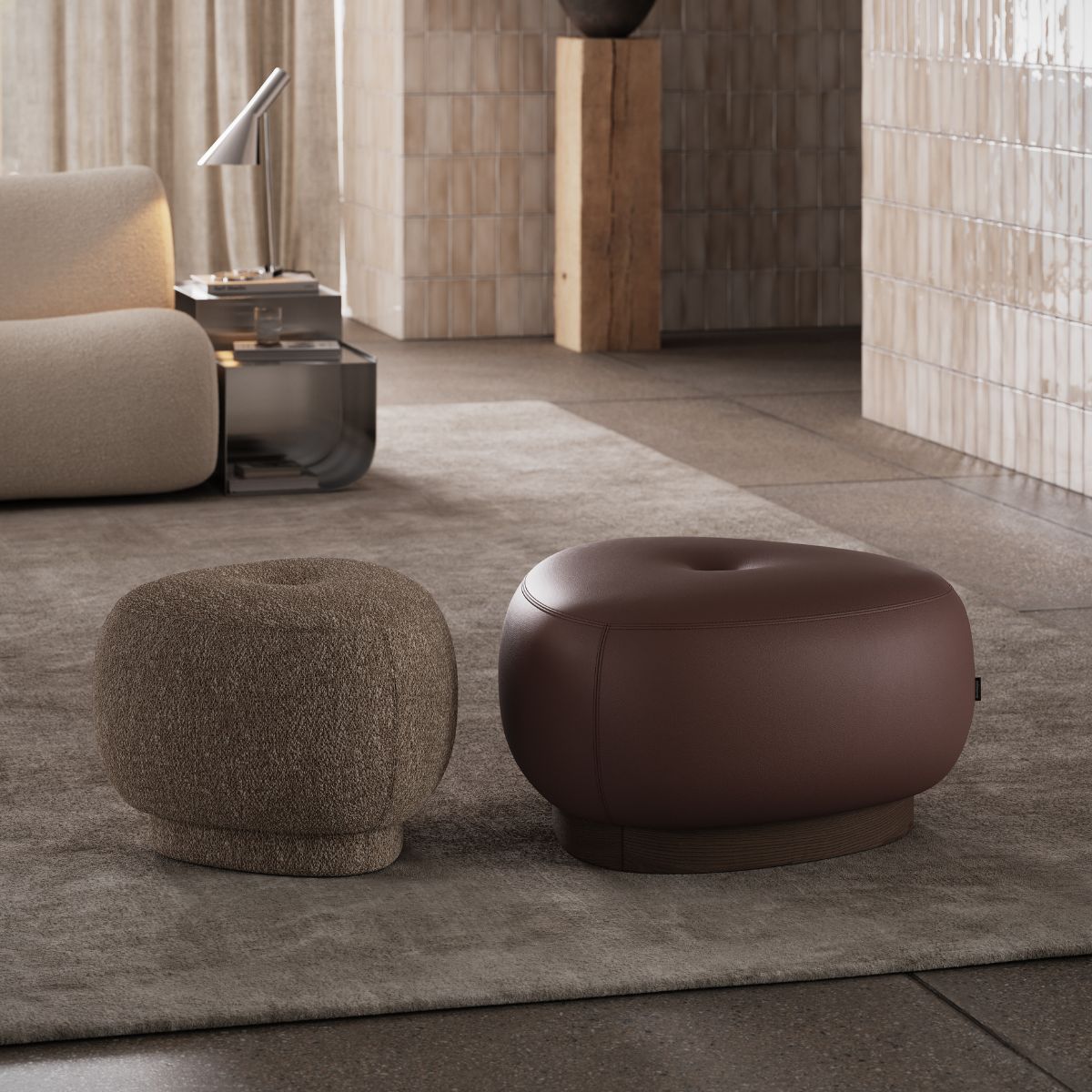 blog article about chocolate brown upholstery by domkapa (1) A modern living room with a plush sofa, two matching poufs, and a decorative lamp, enhancing the space's comfort.