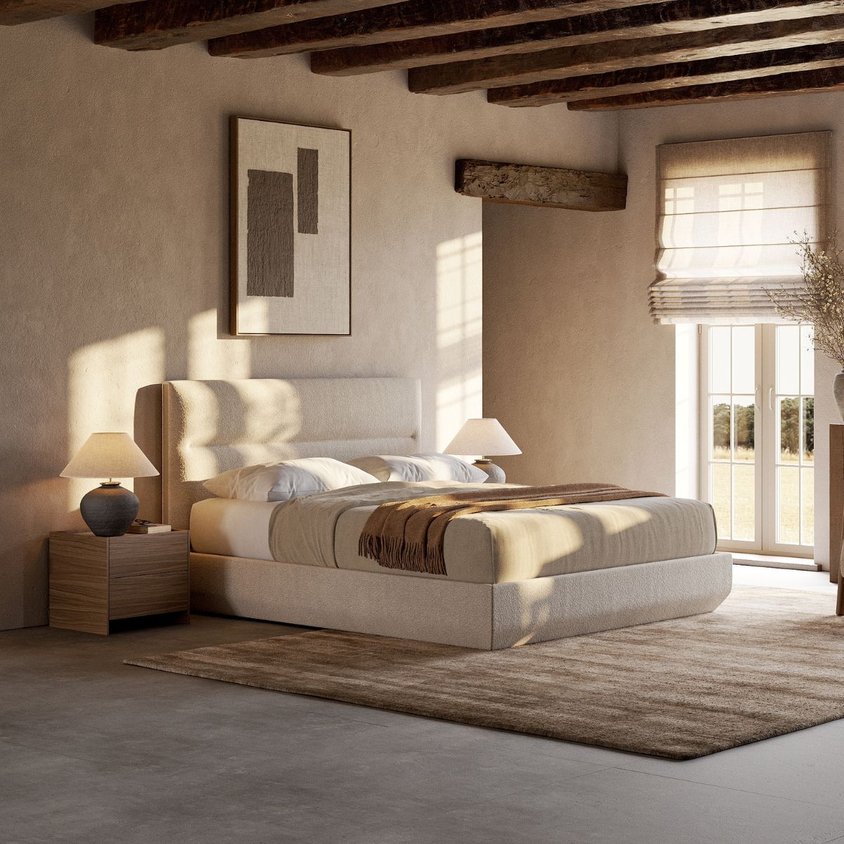 blog article about chocolate brown upholstery by domkapa (2) A serene bedroom scene with a made bed, a simple bedside table, and a lamp casting a soft glow in the room.