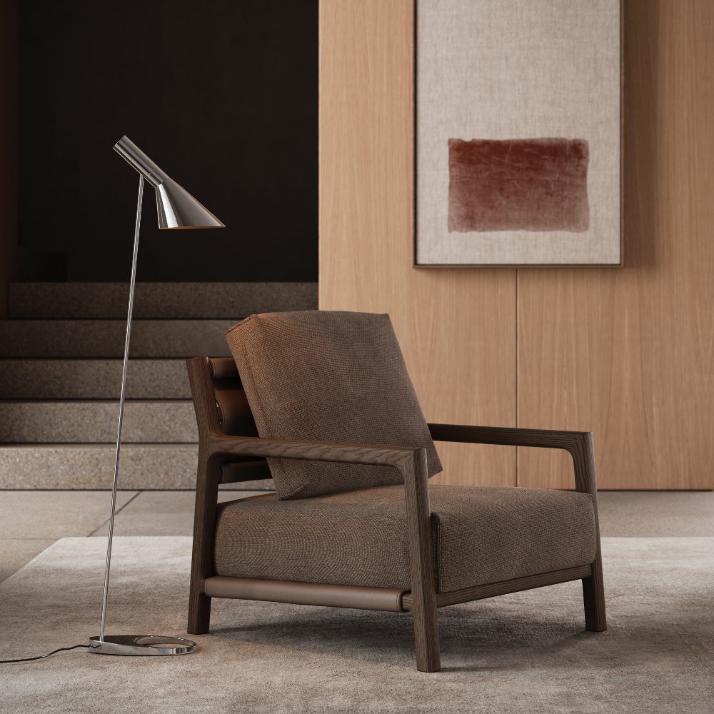 blog article about hybrid living by domkapa (1) An interior scene with a comfortable armchair and a contemporary lamp, contributing to the room's overall design and ambiance.