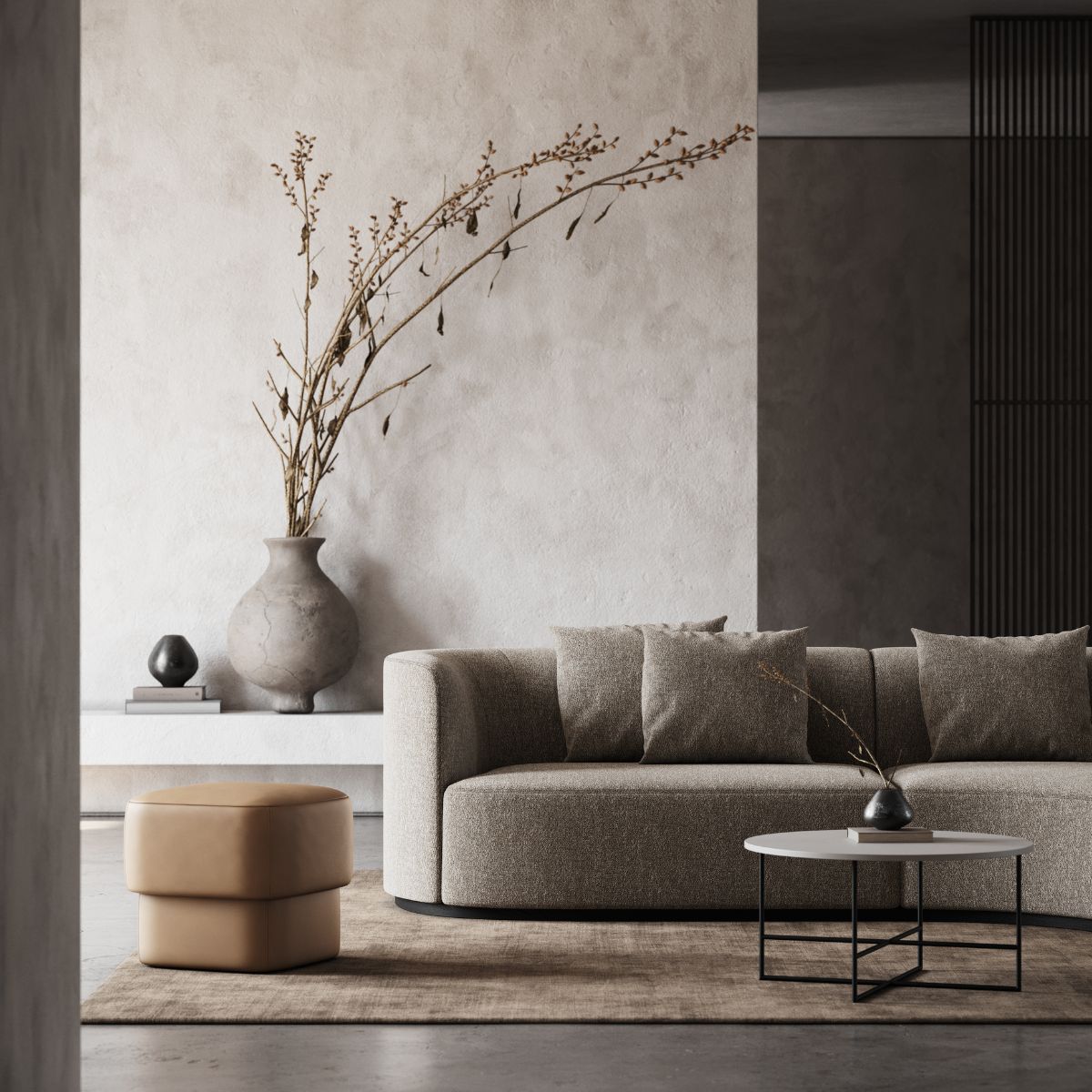 blog article about midiminimalism (4) Midiminimalist living room with a curved sofa in brown tones, a rectangular pouf in honey tones and a coffee table in white lacquer and metal base.
