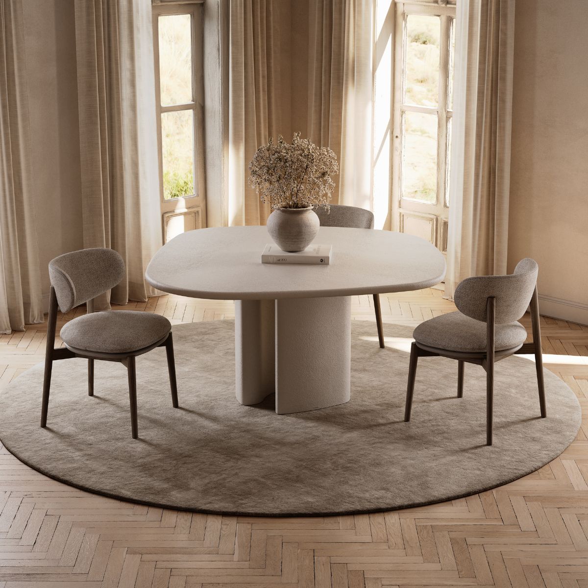 blog article about midiminimalism (6) Dining room with white dining table in an organic form and three dining chairs in neutral colours.