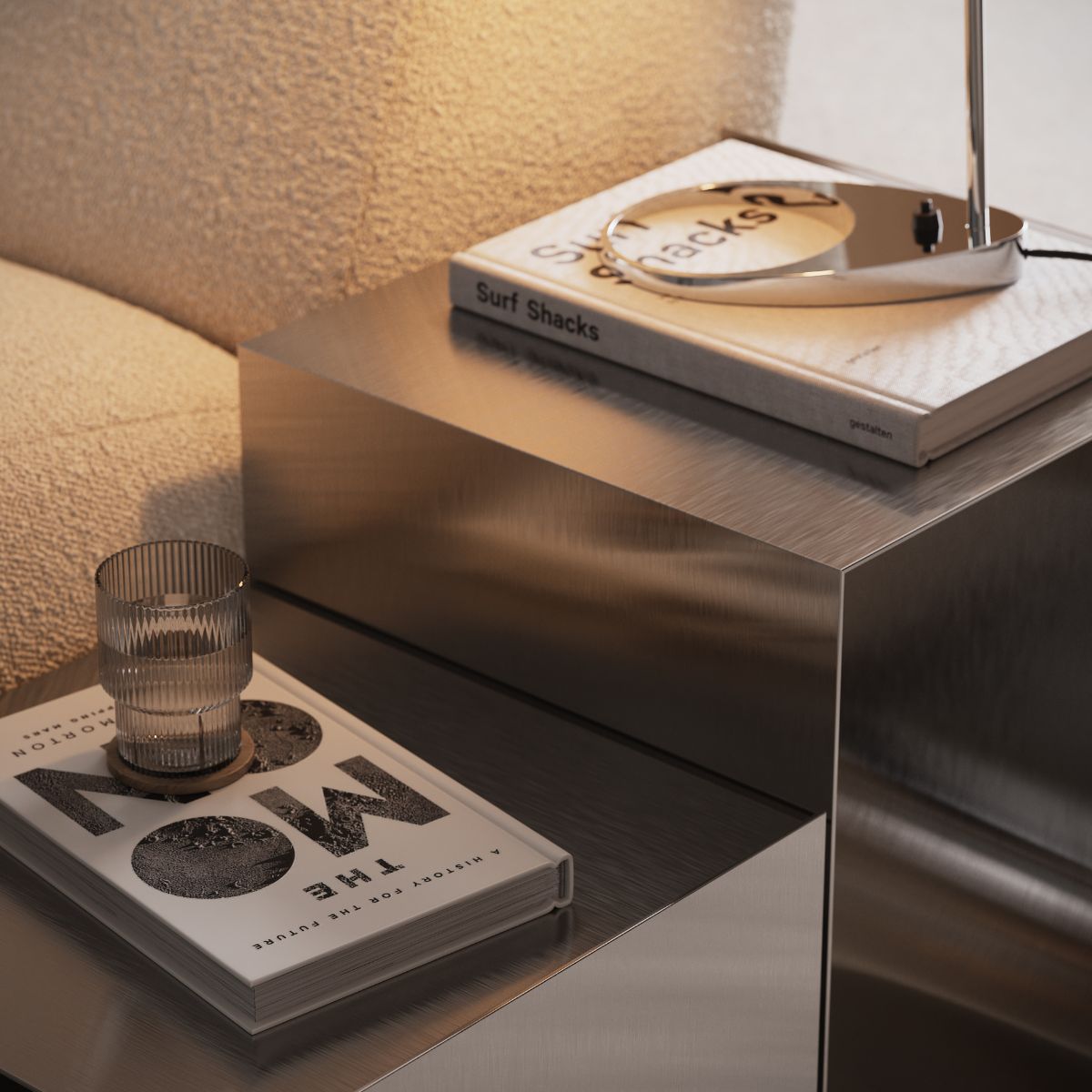 blog article about midiminimalism Table set with design books on its top. A cup of water is placed on top of one of the books.
