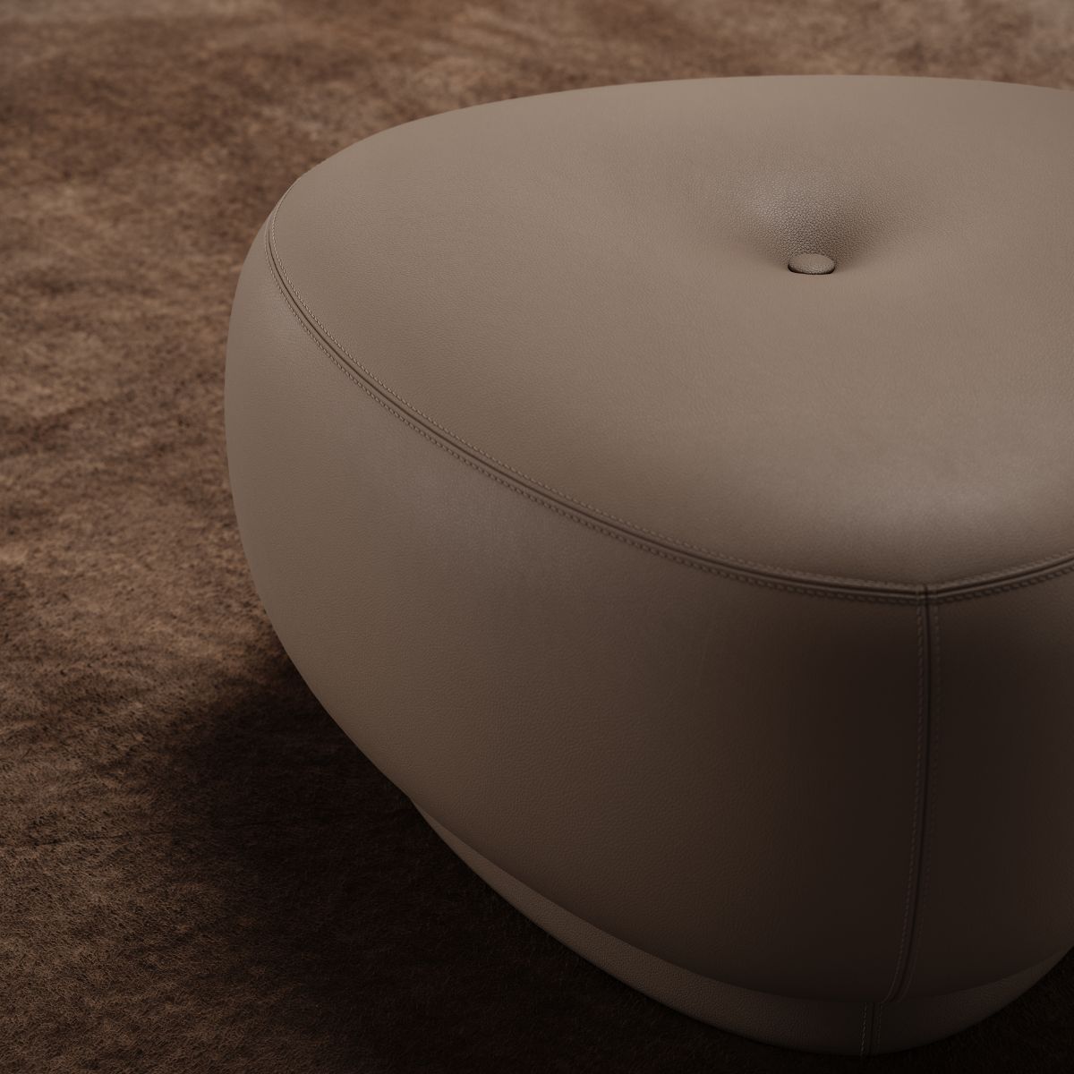 blog article about the end of summer refresh (8) A brown pouf resting on a brown carpet, blending seamlessly into the surrounding decor.