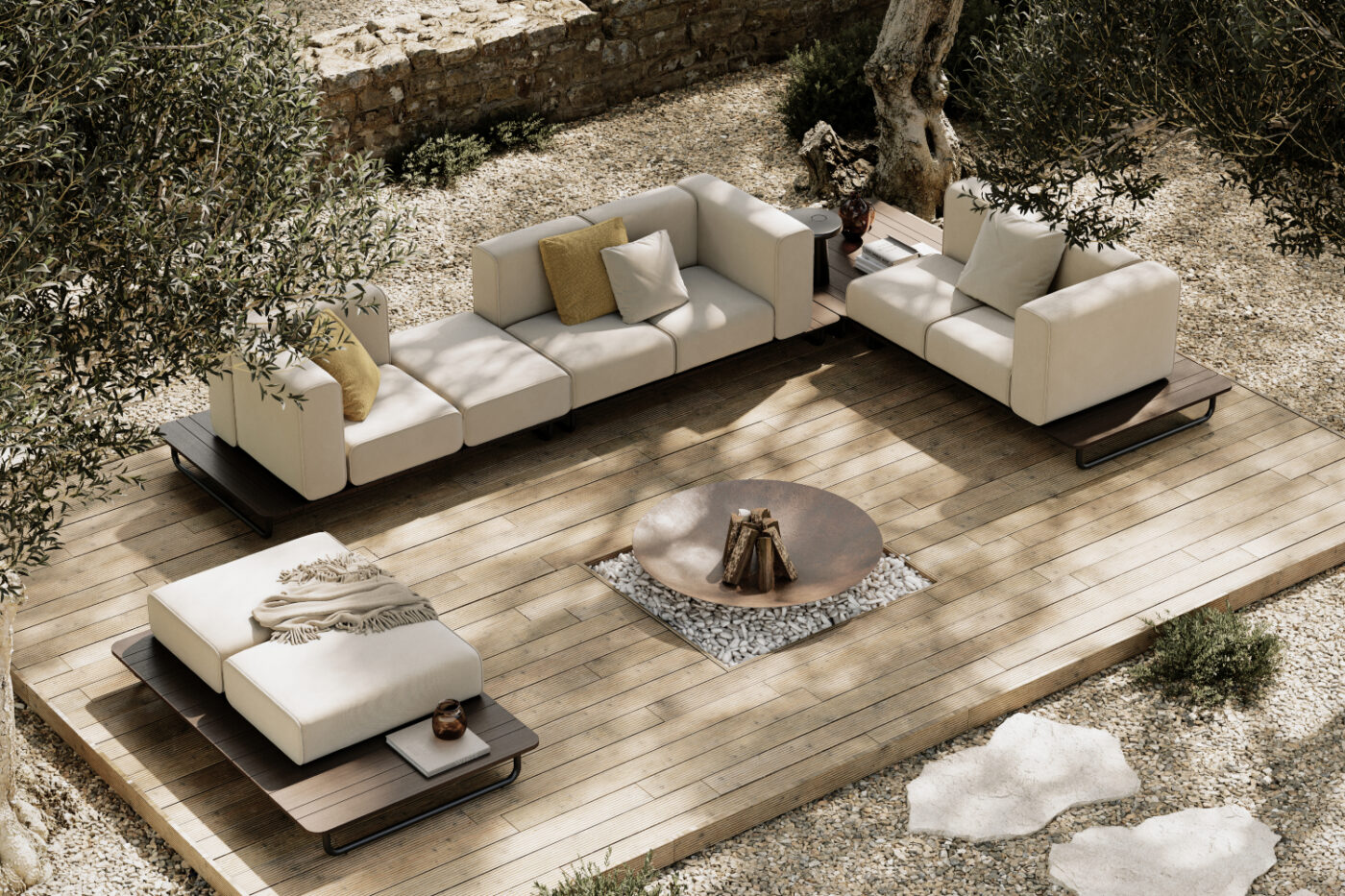 A wooden deck with a stylish white sofa and a fire pit, perfect for outdoor gatherings. Outdoor furniture care guide.
