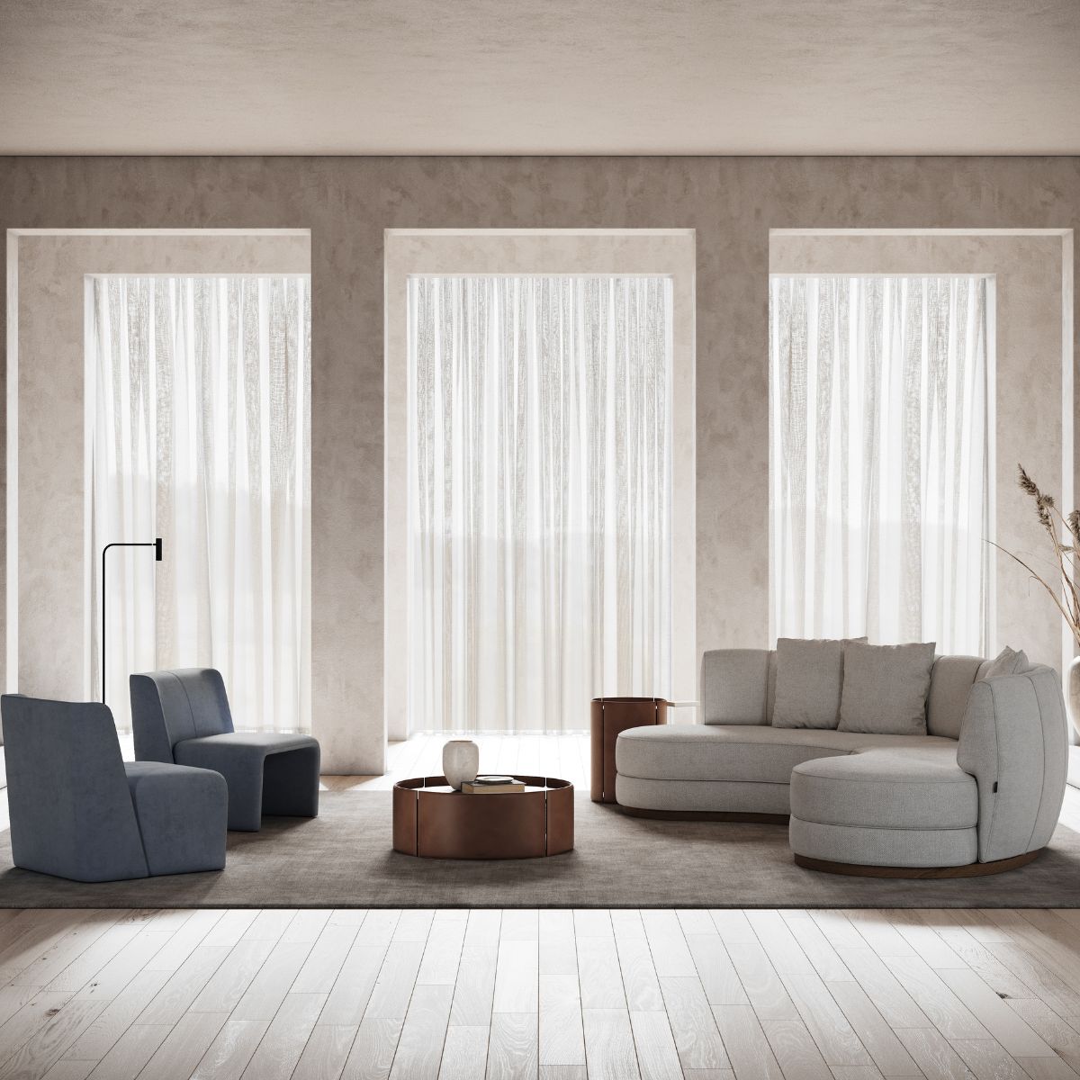curves or clean lines by domkapa (10) A cosy living room featuring a sofa, an armchair, and a coffee table arranged for relaxation and socialising.