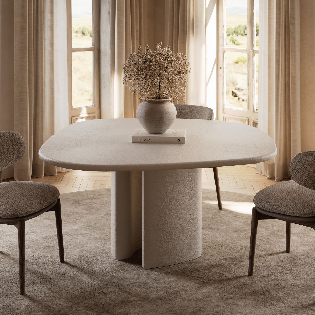 curves or clean lines by domkapa (4) A contemporary dining table accompanied by two chairs and a stylish vase on top.