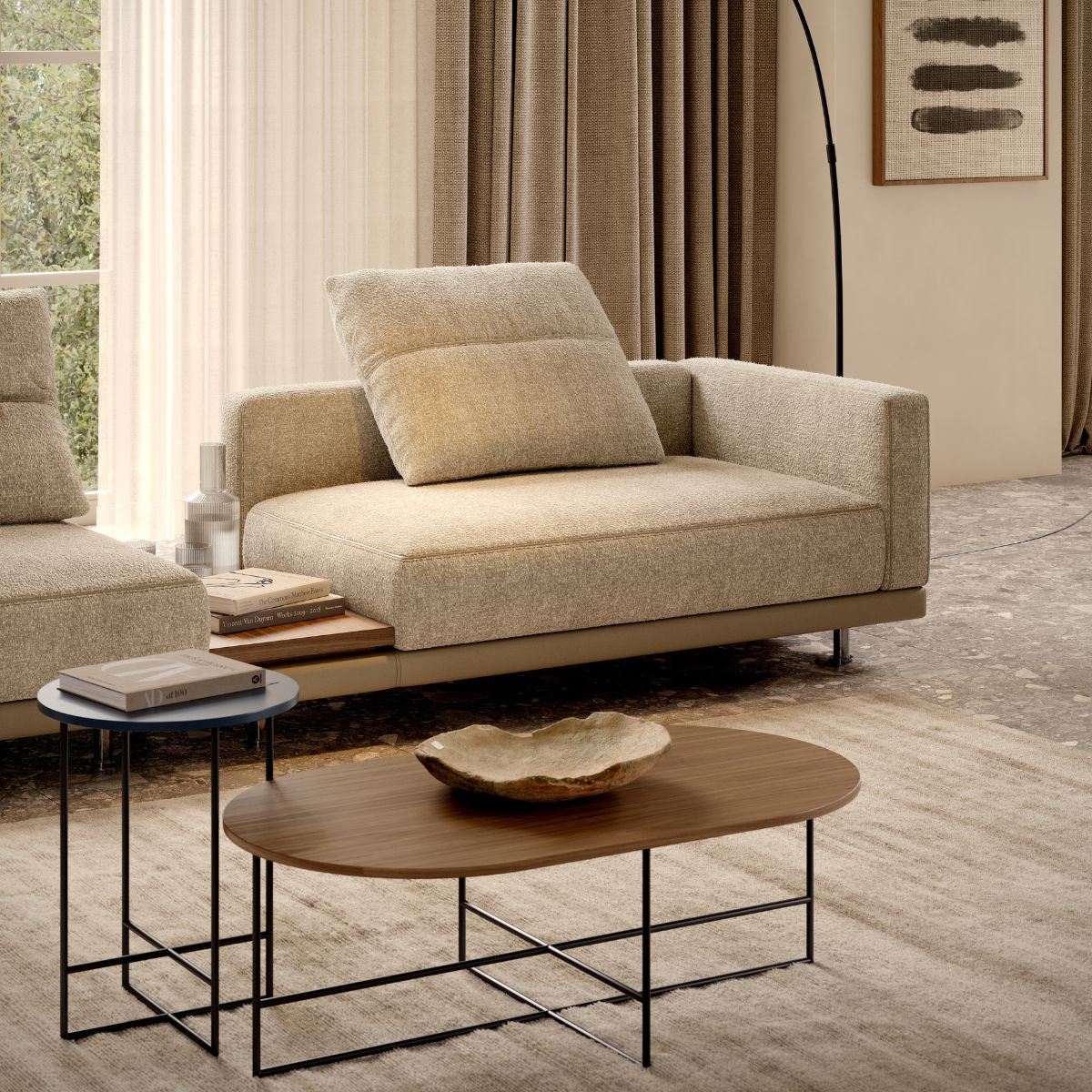 danish interior design Modern living room featuring a beige sofa with plush cushions, a wooden coffee table with a decorative bowl, and large windows with sheer curtains. Cosy and elegant.