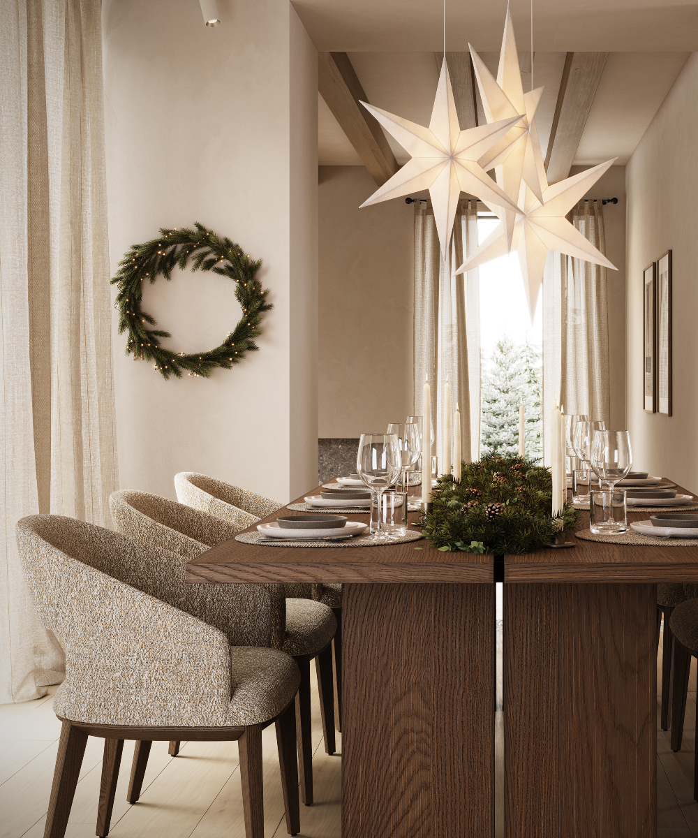 dining room with jermain chair and greenery ornaments A rectangular dining room table with a tablecloth, plates, and cutlery, positioned in a bright dining space.