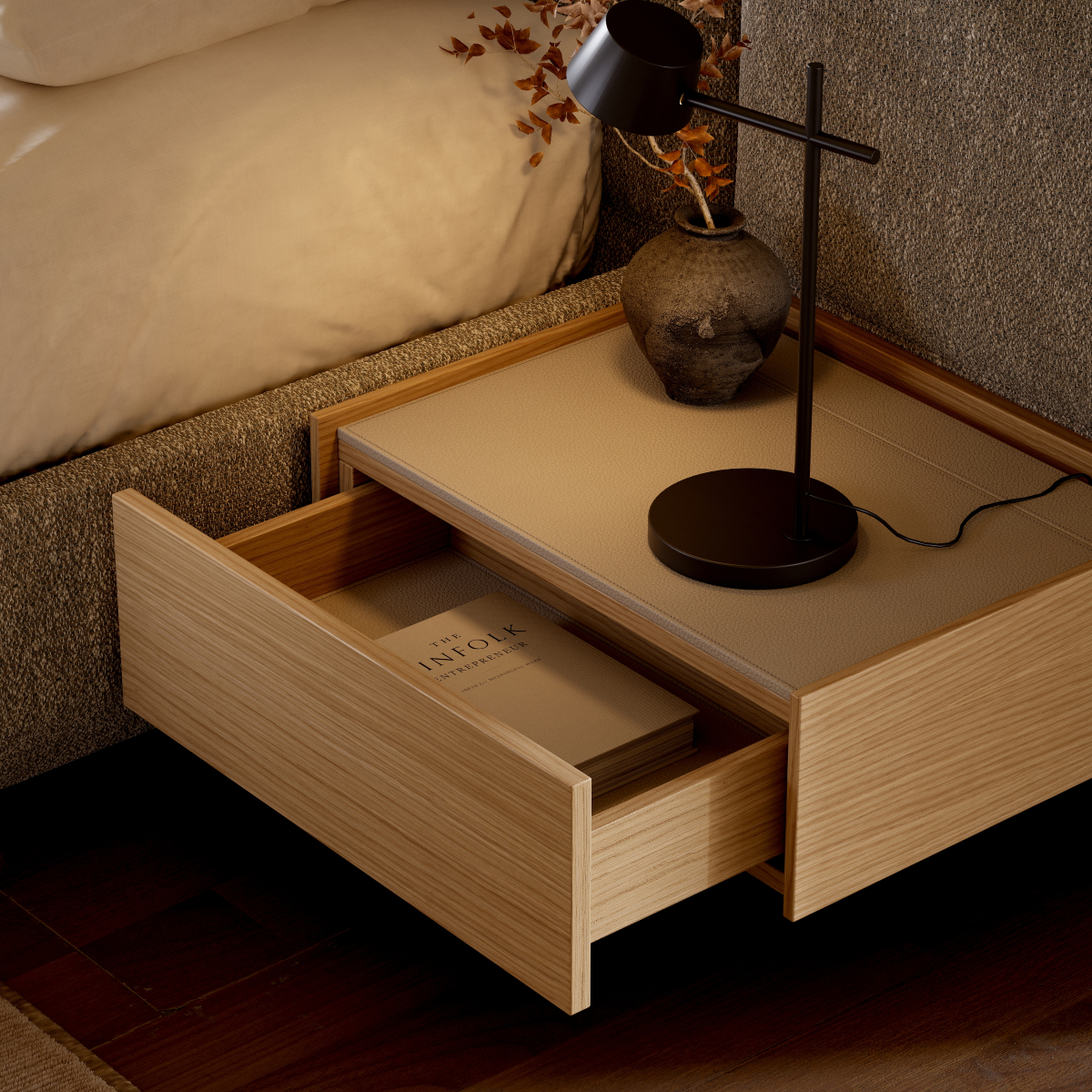A bedside table adorned with a lamp and a book, inviting a peaceful atmosphere for bedtime stories.