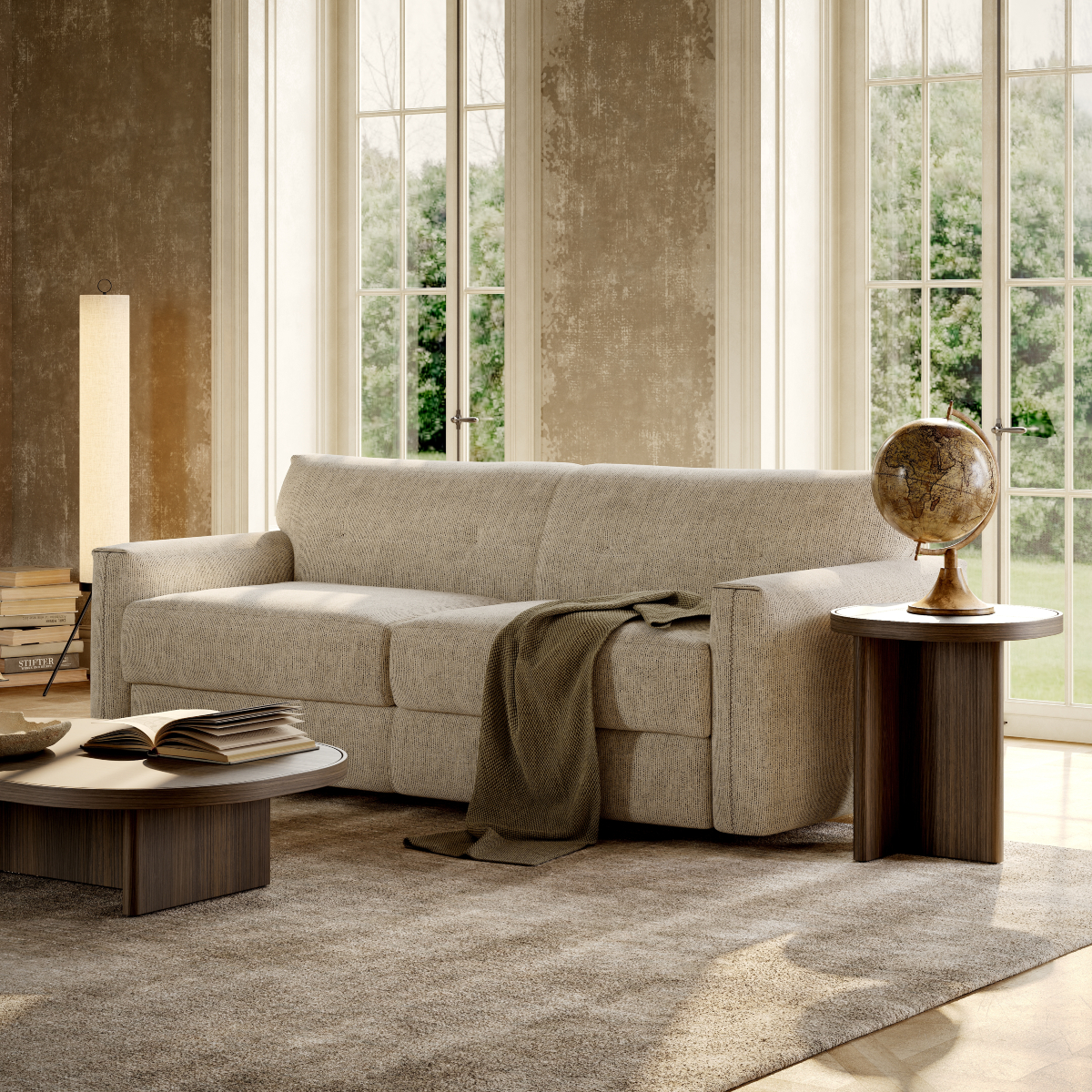 A living room scene with a comfortable sofa bed, a coffee table, and a bright window illuminating the space.