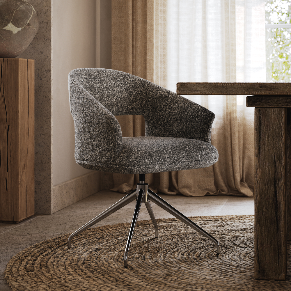 A chair with a soft grey fabric seat, suitable for various interior designs and providing comfortable seating. Suited for home office.