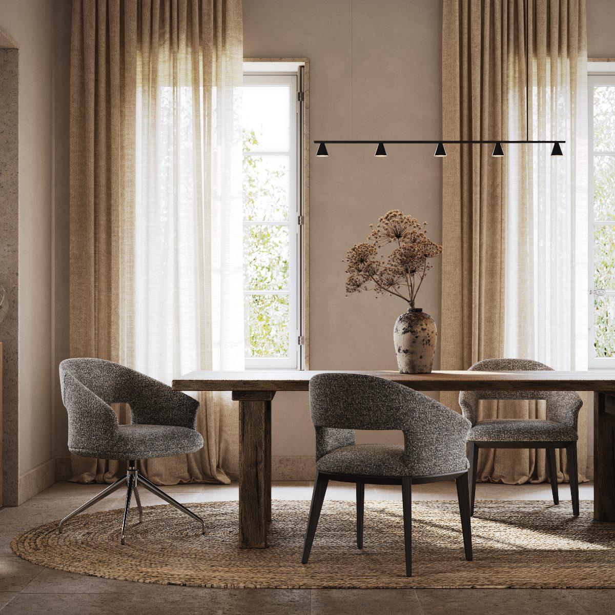 jermain dining chair two base options dining room Elegant dining area with wooden table, woven rug, and gray upholstered dining chairs. Large windows with sheer beige curtains enhance the serene ambiance. Dining chair buyer's guide