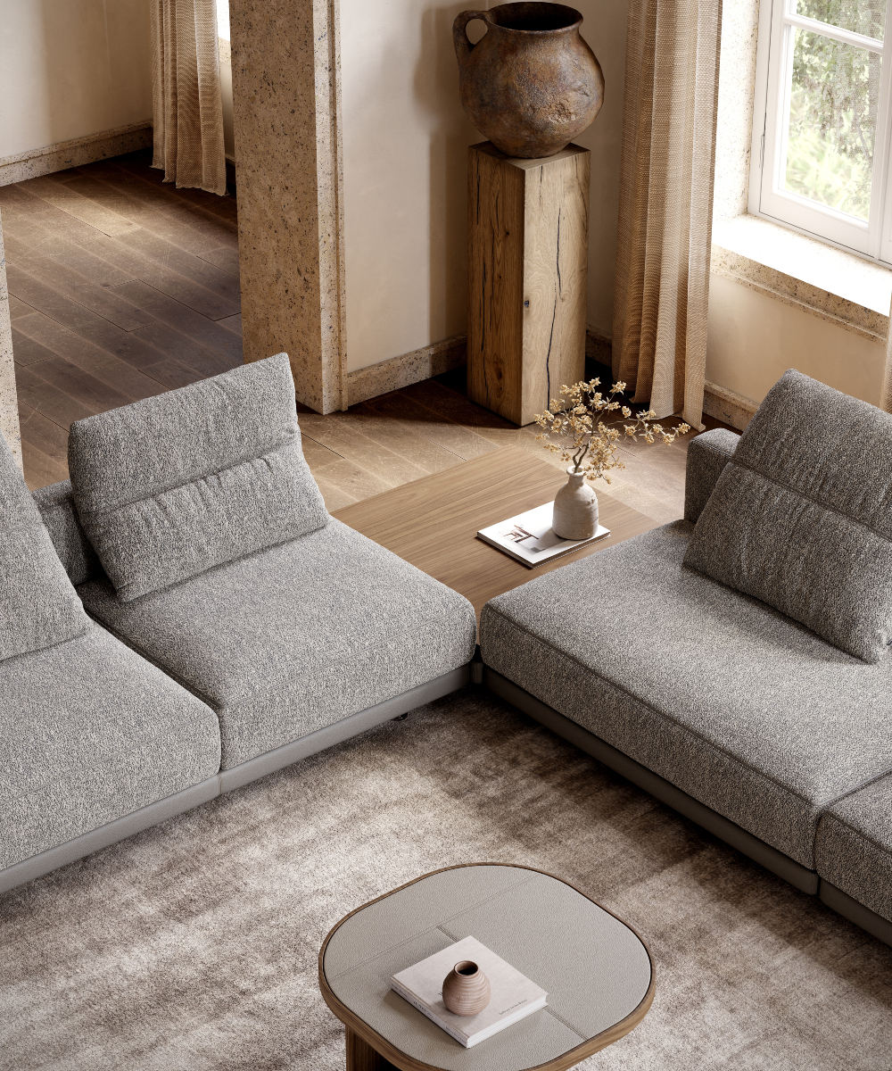 A bright living room showcasing a modular sofa and a coffee table, creating a welcoming atmosphere.