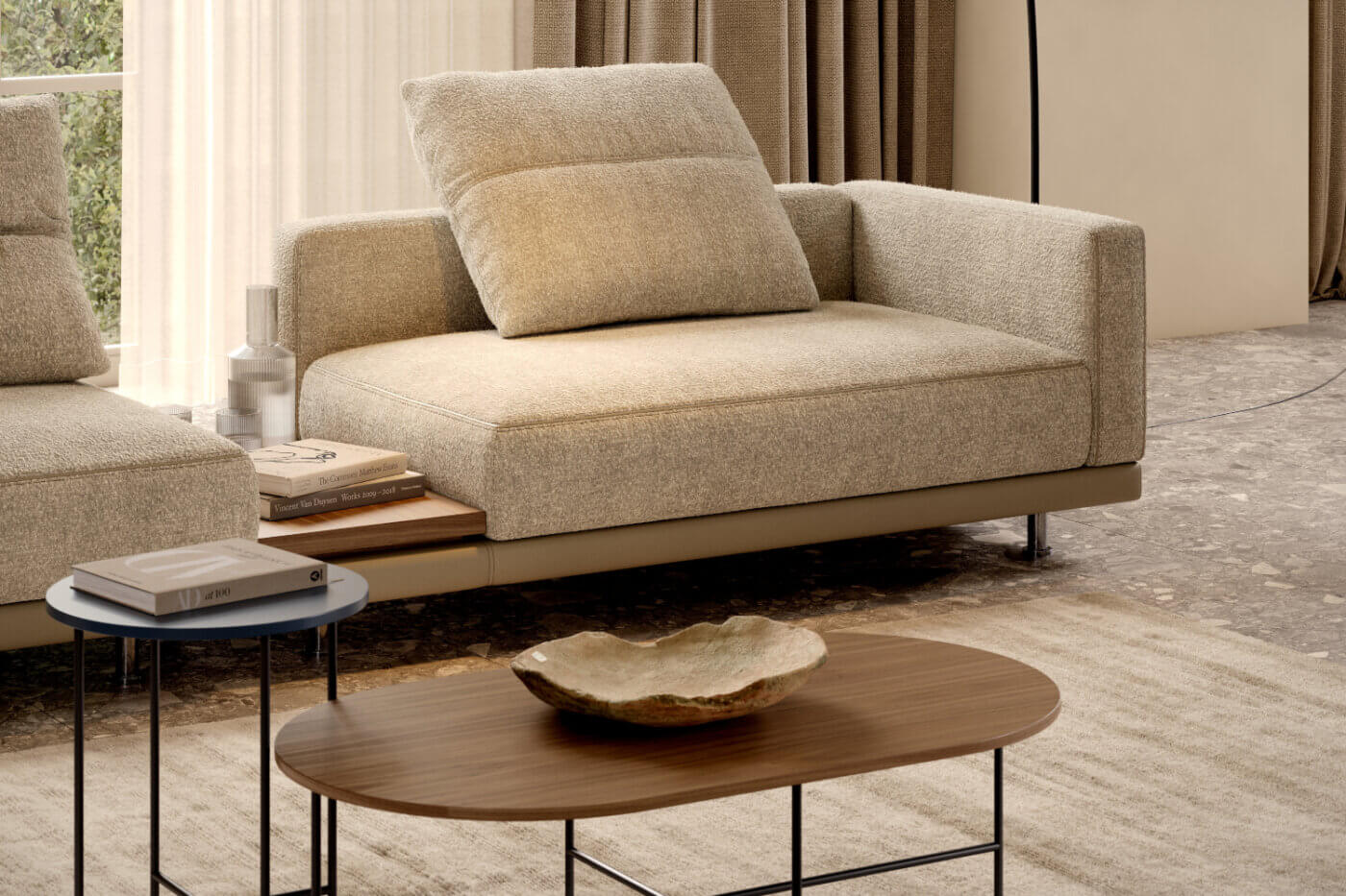 laurent modular sofa and inside tables A contemporary living room with a comfortable modular sofa, a sleek coffee table, and a lamp, designed for relaxation.