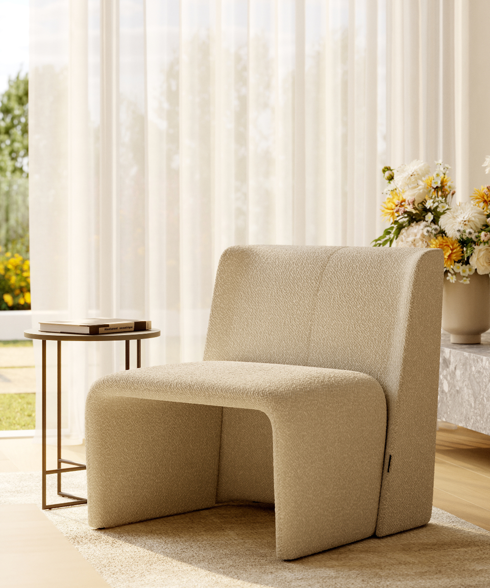 Contemporary living room with a comfortable chair and a minimalist table, designed for relaxation and socialising. Natural Design.