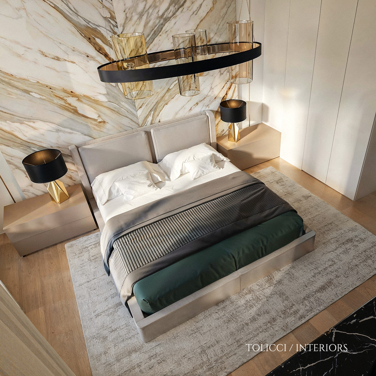 Design Stories: A modern bedroom featuring elegant marble walls and a neatly made bed, creating a luxurious atmosphere.