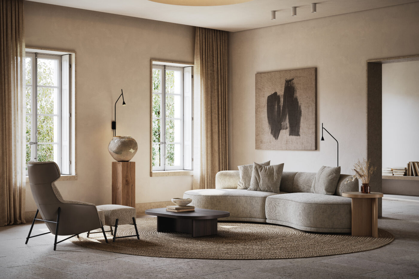 A modern living room showcasing a round sofa paired with a chair, designed for comfort and relaxation. Living room trends for 2026