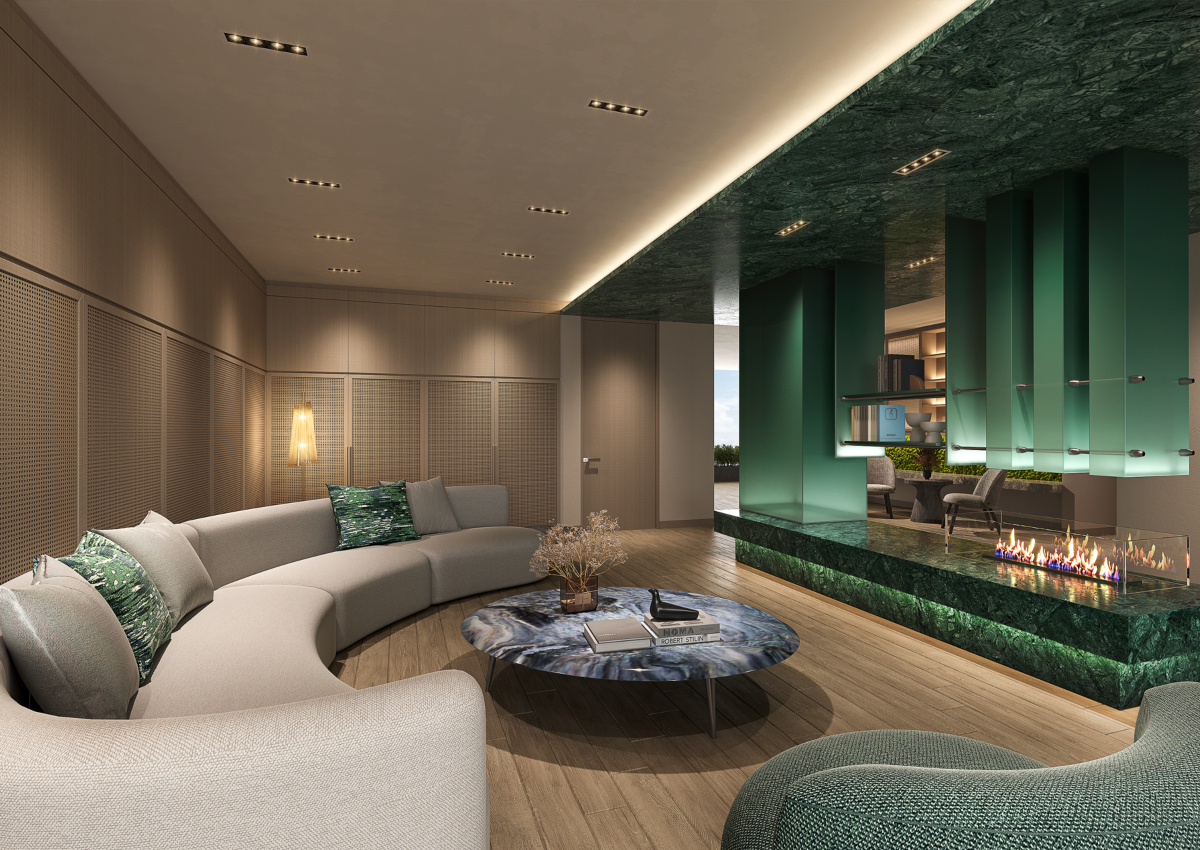 An Asian modern living room showcasing a green marble fireplace, complemented by tasteful furniture and decor.